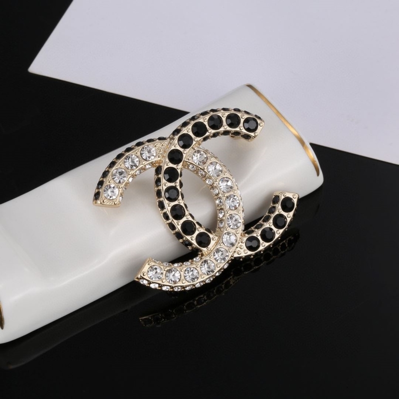 Ch**el brooches